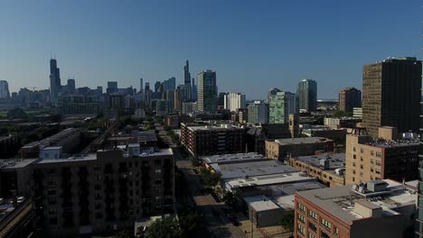 Aerial-View-of-Chicago-Cityscape-Skyline-From-Downtown-Neighborhood-on-Sunny-Day