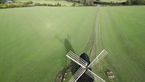 Pitstone-Windmill-with-Four-Sails-in-Buckinghamshire-Field,-Aerial-Drone-View