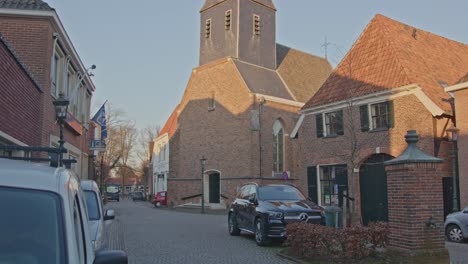 Wide-Tilt-up-of-the-historical-Church-in-the-small-town-of-Bredevoort