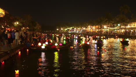 Timelapse-shot-of-colorful-lanterns-on-small-boats-doing-tours-in-Hoi-An