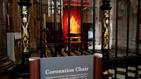 Informative-panel-about-King-Edward-I-Chair-in-Westminster-Abbey-and-Coronation-Chair-in-background