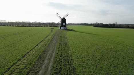 Scenic-Windmill-in-Rural-Countryside-Field,-Aerial-Drone-Flyaway