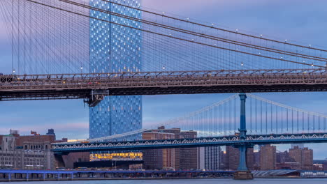 Timelapse-of-the-Brooklyn-Bridge-and-Manhattan-Bridge-during-late-afternoon-with-a-cloudy-sky