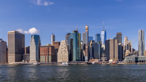 Timelapse-of-New-York-City-facing-downtown-and-the-Financial-District-on-a-sunny-day-with-some-clouds