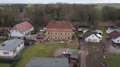 Perfect-aerial-view-flight-dilapidated-Manor-house-Lüssow-Mecklenburg-Western-Pomerania-germany-winter-2023