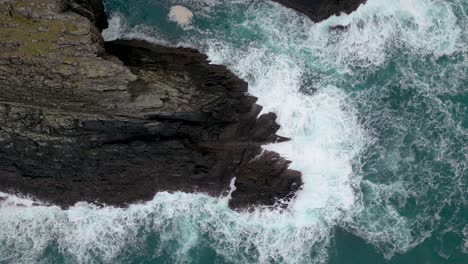 Waves-hitting-the-rocks,-Drone-footage---Cinematic-4K