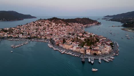 Drone-View-of-the-city-of-Poros,-a-Greek-Island-in-the-Southern-Part-of-the-Saronic-Gulf-in-Greece