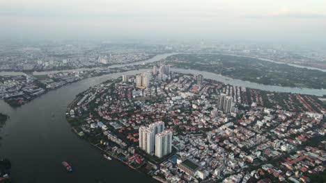 Beautiful-aerial-view-of-asian-architecture-in-Saigon-Vietnam-Thao-Dien-District-2-at-sunset-near-a-river