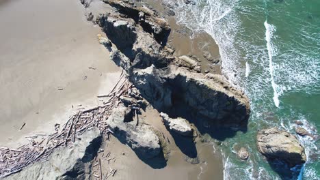 Beautiful-4K-aerial-birds-eye-drone-shot-of-ocean-shore-side