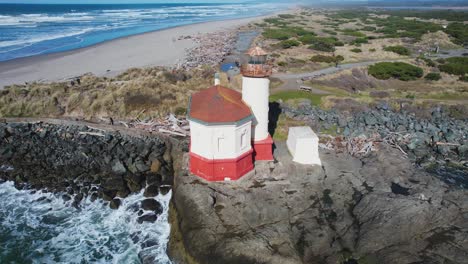 Stunning-4K-aerial-drone-shot-showcasing-Coquille-River-lighthouse-as-well-as-sea-out-into-the-Pacific-Northwest