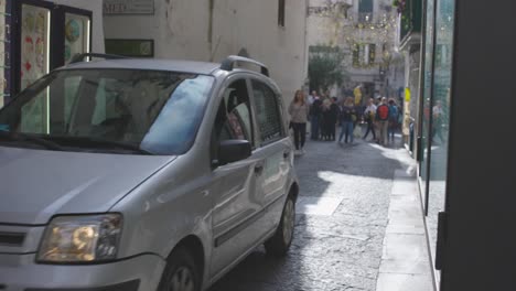 Amalfi-Italy-cars-driving-down-a-small-road