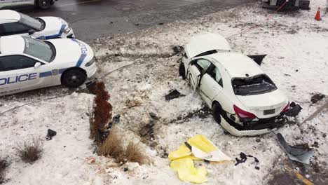 Police-Mobiles-With-Wrecked-Car-At-The-Site-Of-A-Road-Accident-In-Brampton,-Canada