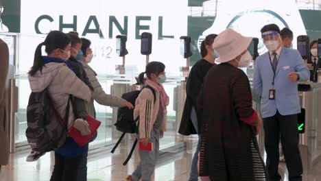 Family-relatives-give-their-last-farewell-before-passengers-go-through-the-departure-hall-at-the-international-airport-in-Hong-Kong