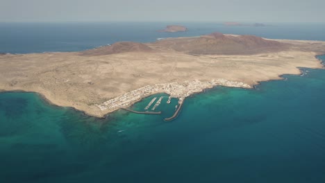 Aerial-view-of-scenic-coastline,-video-captured-at-Mirador-Del-Rio-of-Lanzarote-and-La-Graciosa,-Canary-Islands,-Spain