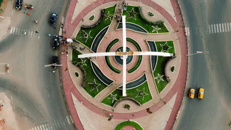 Aerial-view-rising-above-the-Prime-Ministerial-Roundabout,-in-sunny-Yaounde,-Cameroon---birds-eye,-drone-shot