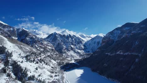 Drone-aerial-view-of-Black-Bear-Pass-Steps-in-Telluride,-Colorado-with-blue-sky