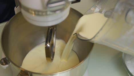 Addition-of-pure-condensed-milk-to-beat-up-icecream-ingredients