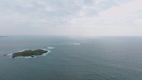 Aerial-Shot-Of-Distinctive-Isle-In-Heart-Of-Ocean-Mirador-de-Monteferro,-Vigo,-Galicia,-Spain