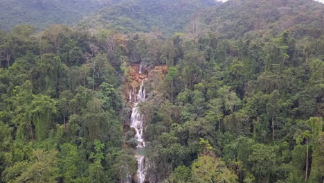 Misty-jungle-flight-to-dramatic-mountain-tired-Kuang-Si-Waterfall