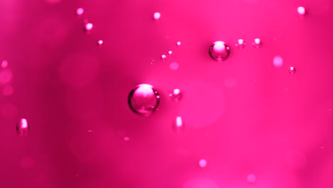 Abstrakter-Wissenschafts--Oder-Kunsthintergrund-Mit-Aufsteigenden-Rosa-Blasen