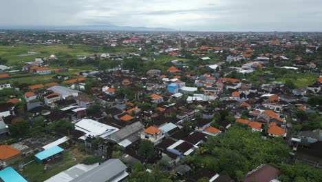 Aerial-shot-of-Canggu-city,-residential-part-of-Bali,-Indonesia