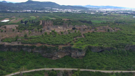 Low-establishing-shot-of-the-historic-Aspendos-ruins-site-in-Turkey