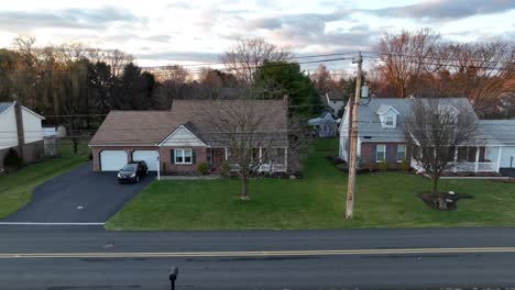 Low-aerial-truck-shot-of-houses-in-America