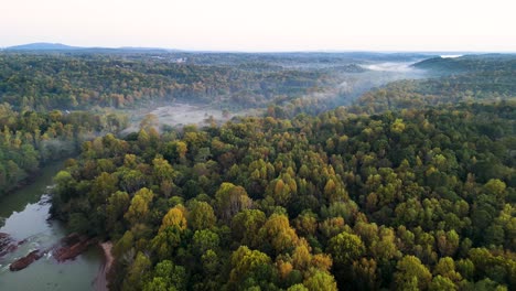 river-passing-through-forest,-Chattanooga-river,-Morning-Drone-shot,-Fog-rising-from-the-water,-Early-Morning-mist