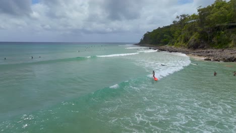 Noosa-Drone-Surf-Session-on-a-sunny-day,-Australia