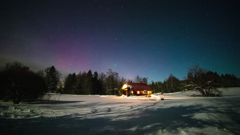 Stars,-aurora-borealis,-and-shadows-from-the-moonlight---snowy-landscape-time-lapse