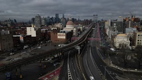An-aerial-time-lapse-of-Williamsburg,-Brooklyn-in-New-York-on-a-cloudy-day