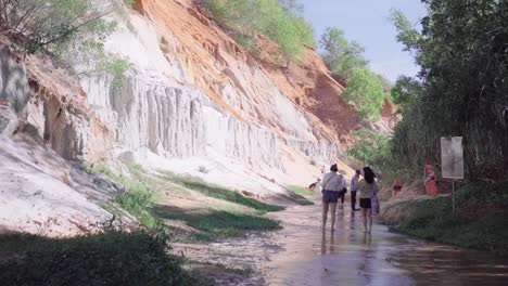 Tourists-strolling-along-the-Fairy-Stream-in-Mui-Ne,-Phan-Thiet,-Vietnam