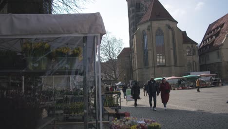 Golden-Hour-Couple-Holding-Hands-Near-Cathedral-Panning-Shot-Schlossplatz-In-Downtown-Stuttgart-in-4K,-Red-Komodo-Cooke-Mini-S4i-Lens-Premium-Quality-|-News