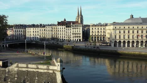 Nive-River-and-Mayou-bridge-with-Bayonne-Town-Hall-building,-France
