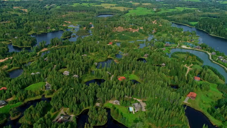 Holiday-home-park-with-small-lakes-and-high-pine-trees