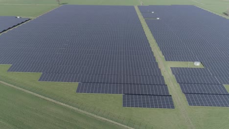 Steady-aerial-shot-of-a-solar-panel-field