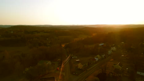 Aerial-drone-view-of-Lancaster-Pennsylvania-countryside-during-sunset
