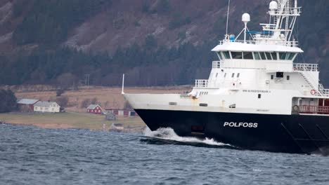 The-container-ship-Polfoss-Eimskip-sailing-across-Lepsøyrevet,-Ålesund