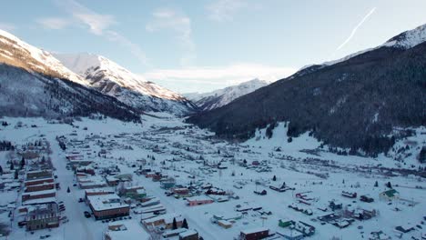 Drone-aerial-view-of-Silverton,-CO-in-the-winter-during-golden-hour
