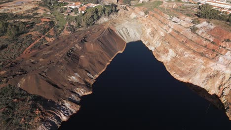 Contaminated-lake-and-landscape-of-Sao-Domingos-Mine,-drone-aerial-top-down-view