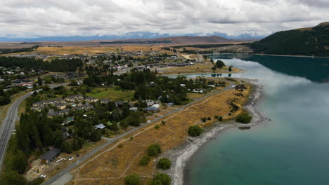 Small-township-near-lake-Tekapo-in-New-Zealand,-aerial-drone-view