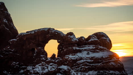 Timelapse,-Sunrise-Above-Arches-National-Park-Utah-USA,-Natural-Arch-and-Sandstone-Rock-Formations-Silhouettes
