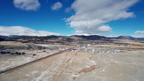 Drone-aerial-views-of-Fairplay,-Colorado-in-the-winter-on-a-sunny-day