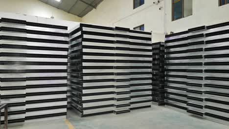 sliding-shot-in-a-warehouse-where-different-types-of-finished-metal-materials-are-stored