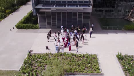 Aerial-View-of-a-Family-Dancing-Out-of-Montpellier-City-Hall-for-a-Wedding