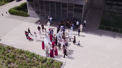 Aerial-View-of-a-Family-happy-Dancing-Out-of-Montpellier-City-Hall-for-a-Wedding