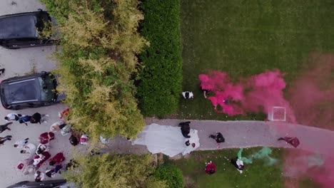 Aerial-view-bridal-Car-Arrival-at-Outdoor-Ceremony-Venue-with-smoke-red