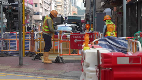 pedestrians-wearing-mask-avoiding-road-blocks