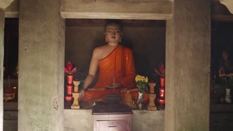 A-Buddha-statue-inside-a-chapel-in-Marble-Mountain,-Da-Nang,-Vietnam