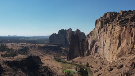 Aerial:-Smith-Rock-in-Central-Oregon,-a-rock-climber's-paradise
